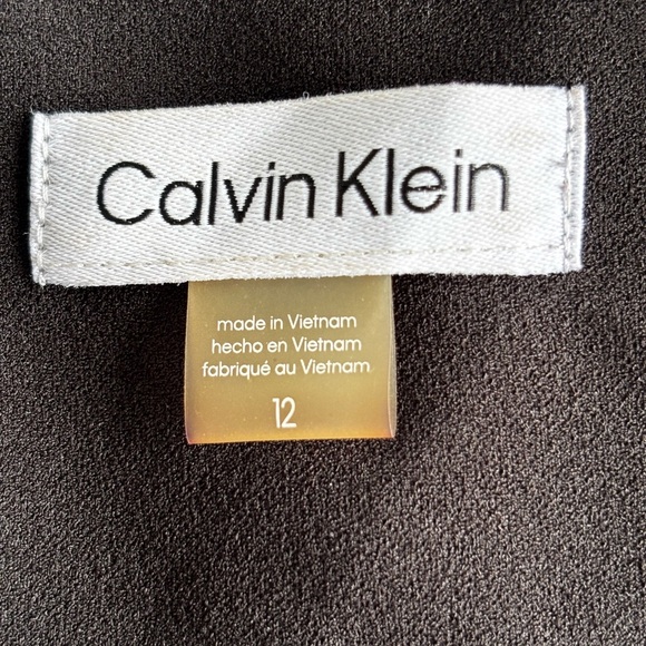 Calvin Klein
Boat Neck Short Sleeve Belted Ruffle Hem Faux Wrap Dress - Picture 5 of 12